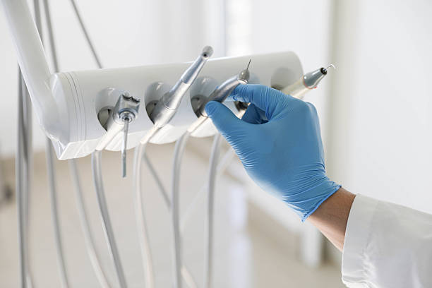 Professional Tooth Extraction technician working in Vinings, GA
